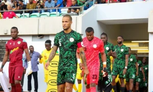 Head coach of the Zimbabwe national team, Michael Nees, has insisted that Nigeria messed up their 2026 FIFA World Cup qualifying campaign from the start. Nees noted that the Super Eagles have had three different coaches during the qualifiers so far. Finidi George and Austine Eguavoen both coached the Super Eagles in the early stages of the World Cup qualifying campaign before the Nigeria Football Federation, NFF, appointed Eric Chelle as head coach in January. Create a Scorecard in Minutes - Interactive Content Generator scoreapp.com Create a Scorecard in Minutes - Interactive Content Generator Ad Speaking after Sunday’s training session in Uyo, Nees also expressed optimism that his team are ready to turn their campaign around when they face the Super Eagles on Tuesday. “Nigeria are halfway through the campaign. Nigeria, in terms of individual players, are top class, absolutely top class,” Nees told the Warriors media team. “They messed up their campaign in the beginning. This is their third coach in the qualifiers. They won in Rwanda, who have always been a tricky opponent for them. “They will now come with confidence and full strength, looking to turn their campaign around—just as we are.” Nigeria currently sit in fourth position in Group C with six points, while Zimbabwe are bottom of the table with three points.