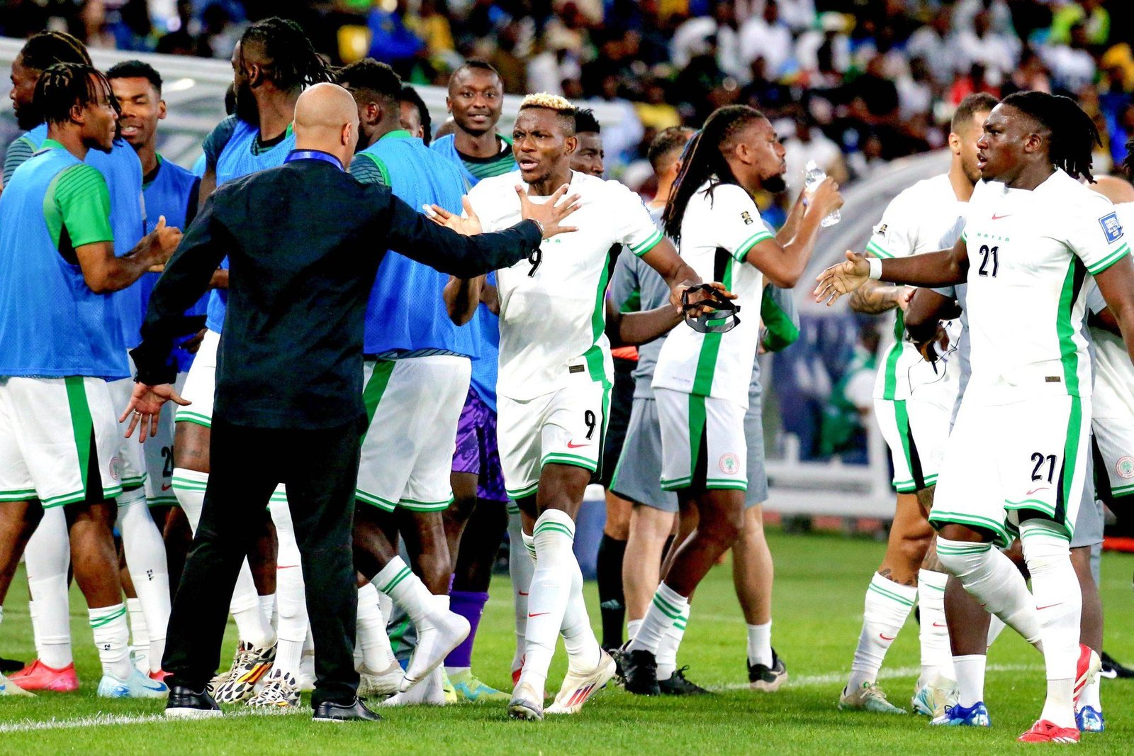 Coach Chelle tightens Super Eagles camp access after a dominant 2-0 win over Rwanda, ensuring full focus for the crucial Zimbabwe clash.