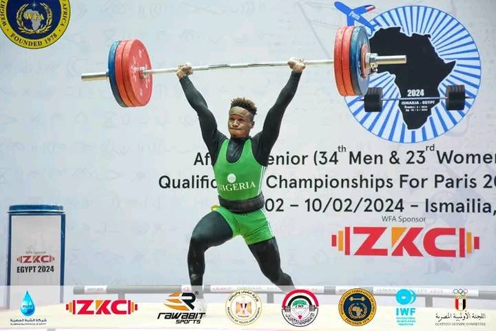 Edidiong Umoafia, a 22-year-old weightlifting star from Nigeria, is living up to his name “Blessing” by breaking records and winning medals