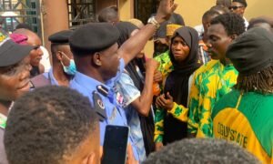 ACP Alabi Akinjide meets Ogun State athletes as the protest over unpaid allowances and broken promises at the ongoing 2024 Gateway Games.