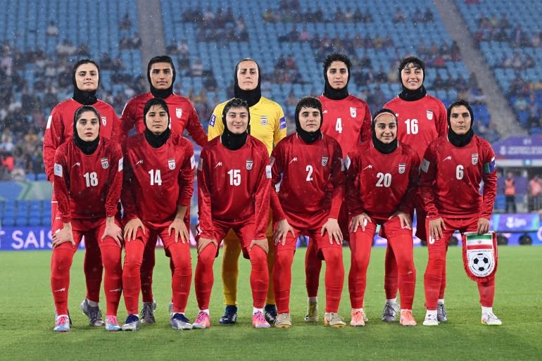 Australia has granted visas to five Iranian women footballers after safety concerns emerged when they refused to sing the national anthem.