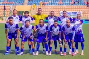 Doma United coach Najib Mabo targets NNL Super 4 glory, insisting history not prize money is the driving force after securing NPFL promotion.