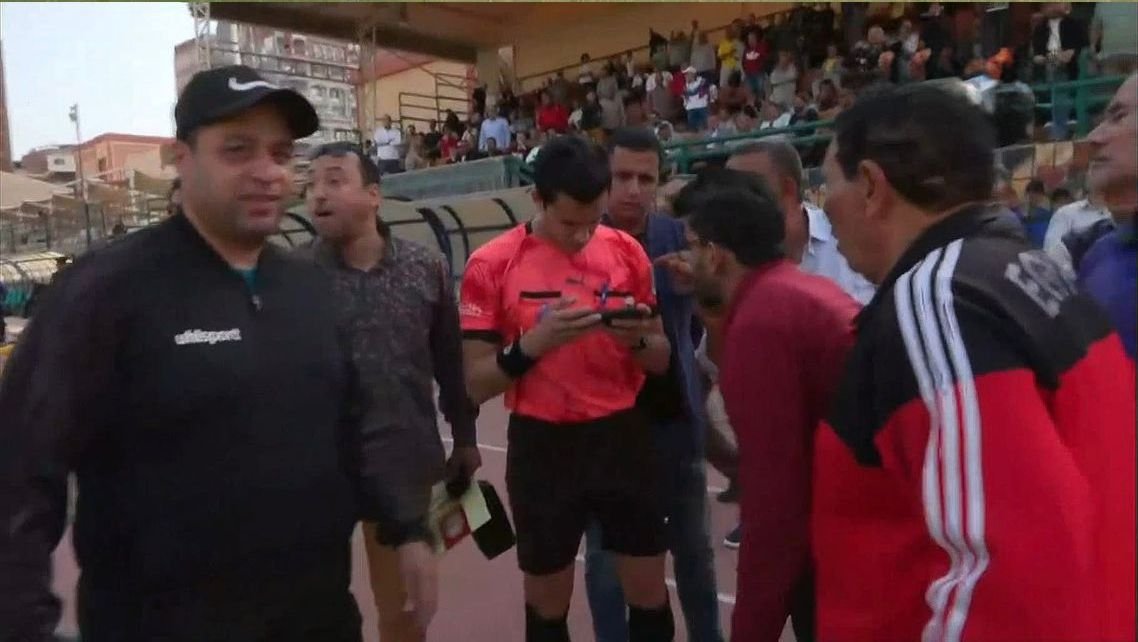 Referee suspended after using phone as VAR in Egyptian second division match, triggering investigation and controversy.