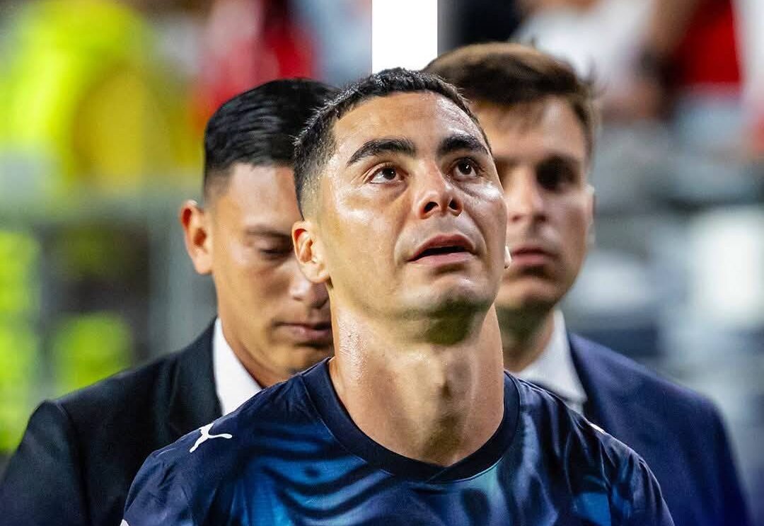 Miguel Almirón became the first player sent off at the 2026 FIFA World Cup for covering his mouth while speaking to an opponent. But does the rule apply to teammates too? Here's what football's new law actually says.