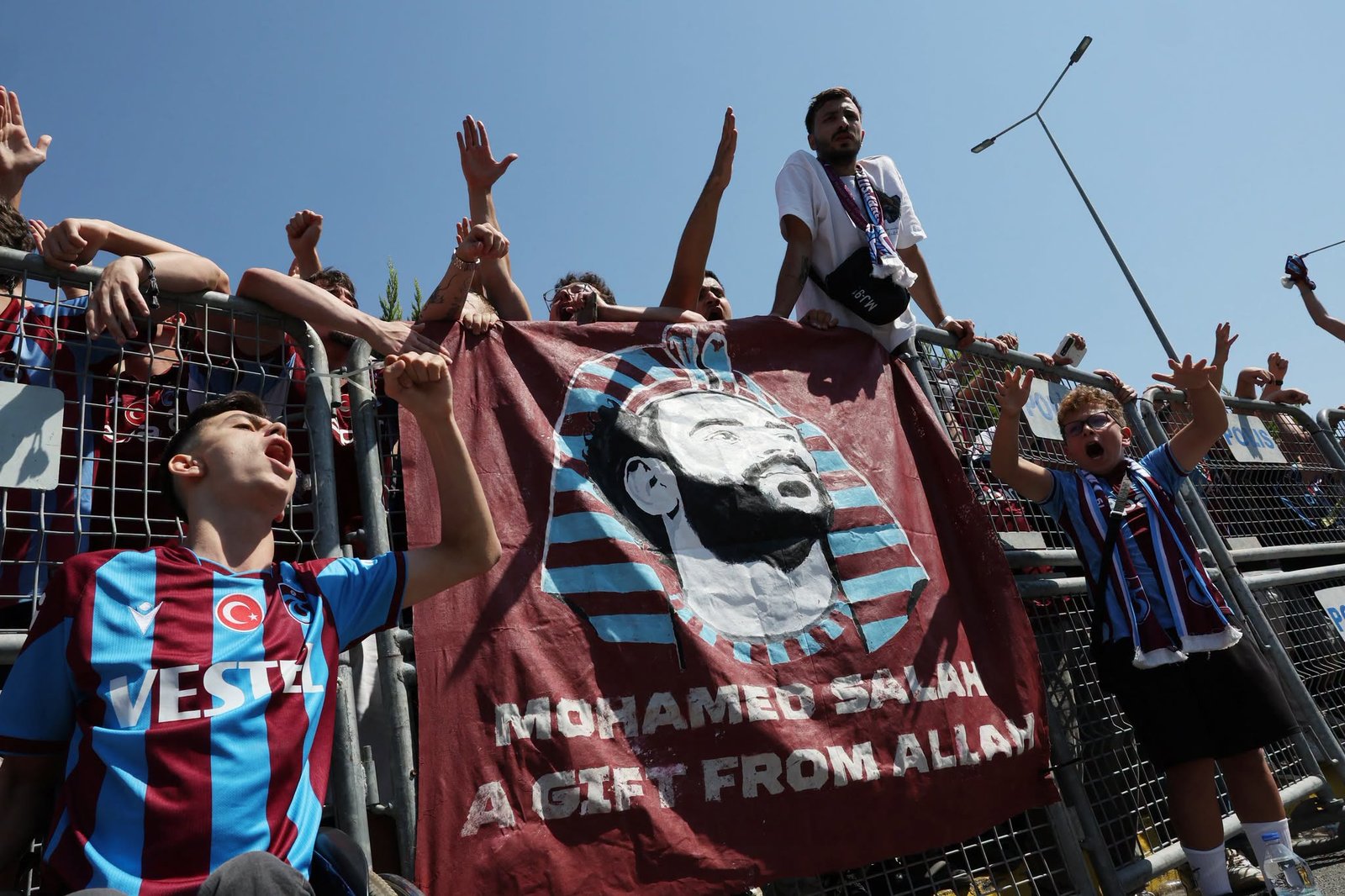 Mohamed Salah has completed a sensational free transfer to Trabzonspor, where ecstatic supporters welcomed the Liverpool legend with a banner reading "Mohammed Salah, a gift from Allah" as Turkish football celebrated one of its biggest-ever signings.