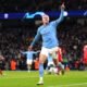 Erling Haaland urges Manchester City to stick together after beating Liverpool 3-0 at Anfield, with the club appealing an independent commission’s financial-rule verdict.